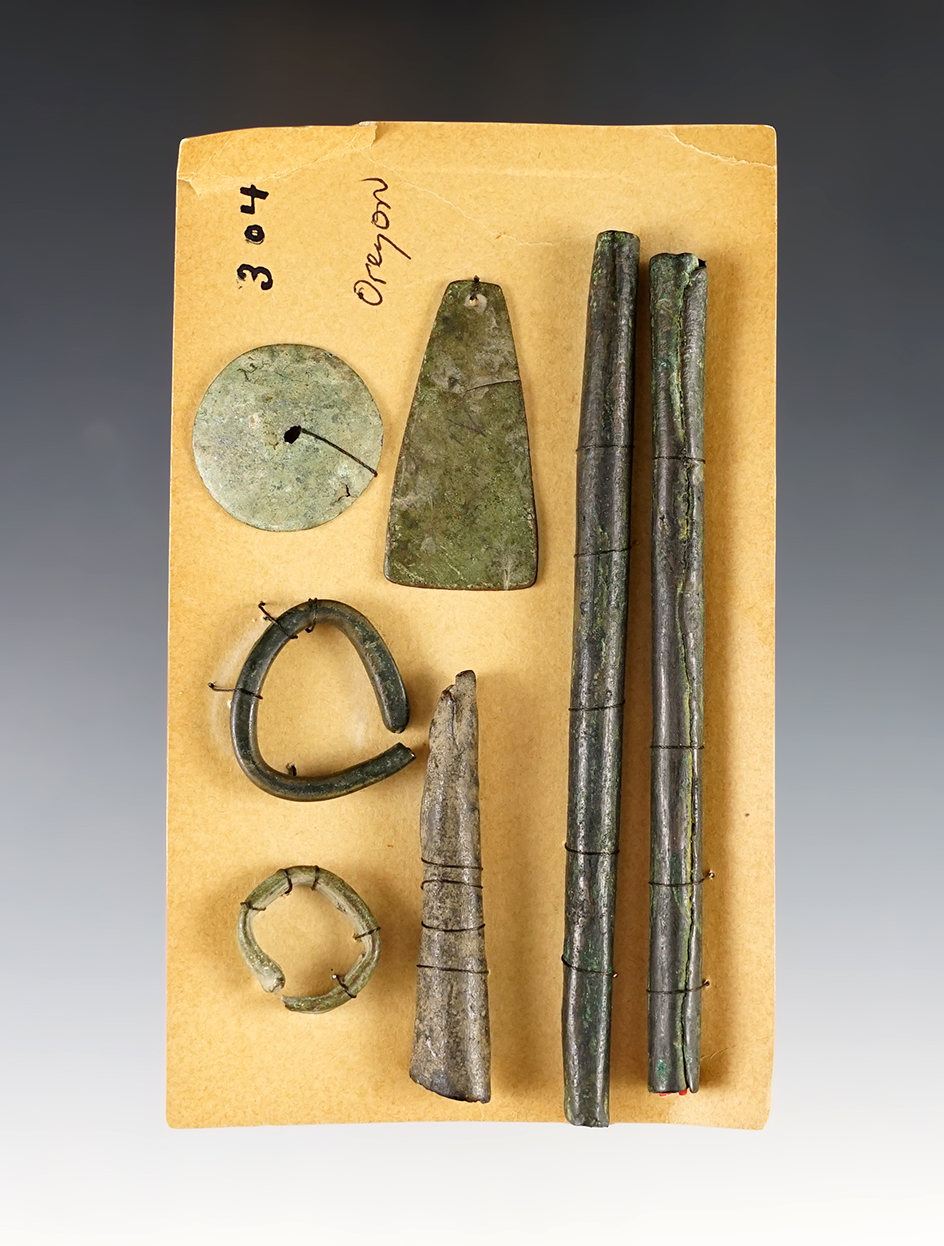 Unique group of seven copper artifacts recovered at a site in Oregon. Largest is  is 4 3/8".