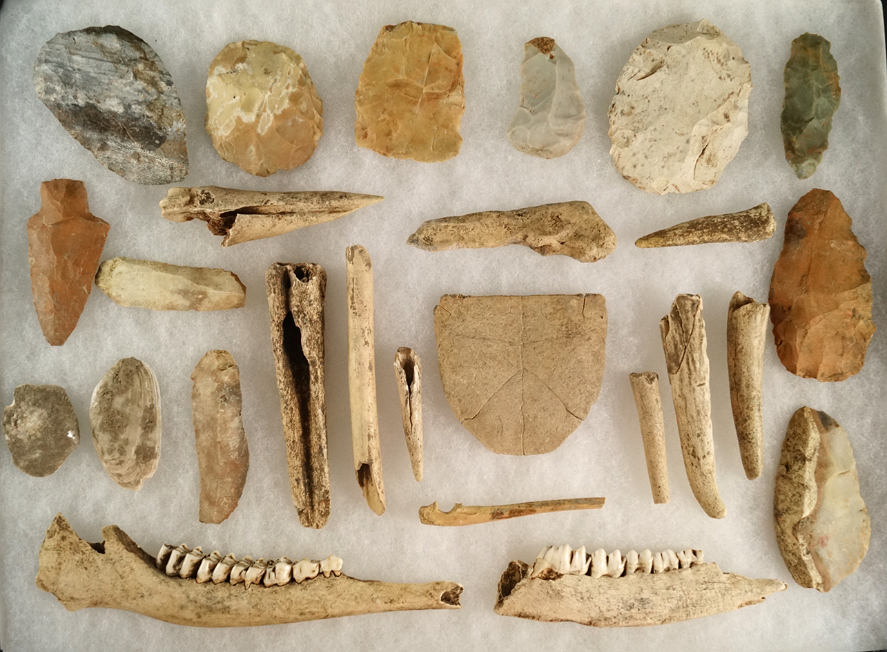Nice assortment of artifacts from a rock shelter dig in Arkansas including scrapers, knives, bone, a