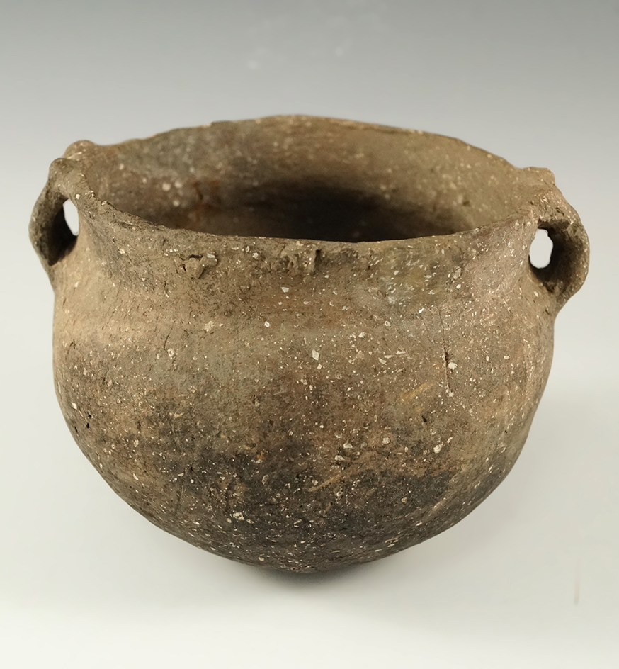 3 1/4" tall by 4 3/4" wide Strap Handled Mississippian Jar found in Mississippi Co., Arkansas.