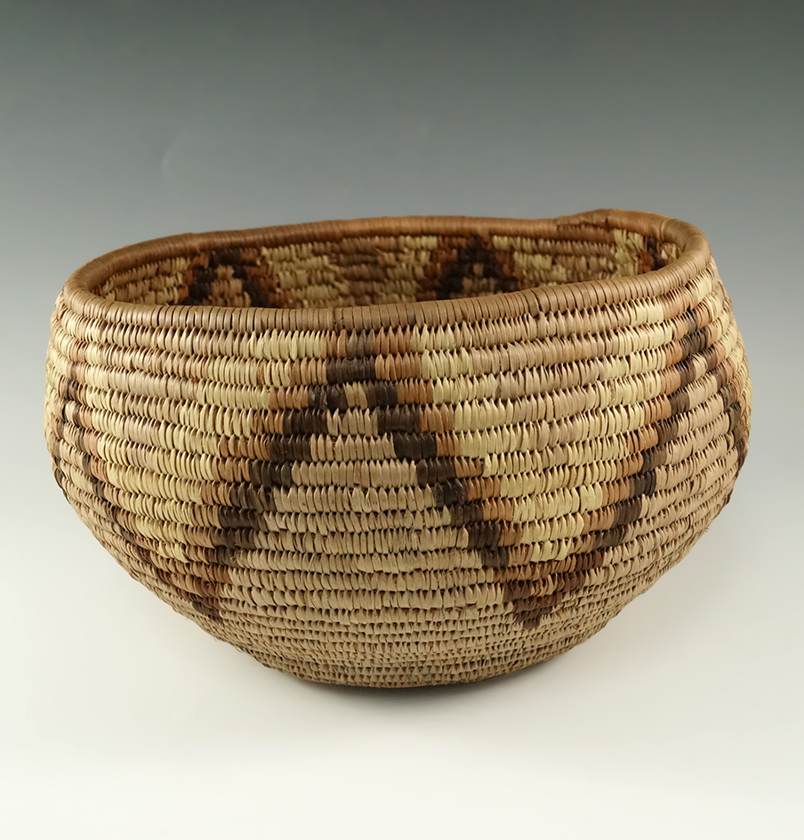 Very nicely made 8 1/2" wide by 5 1/2" tall basket.