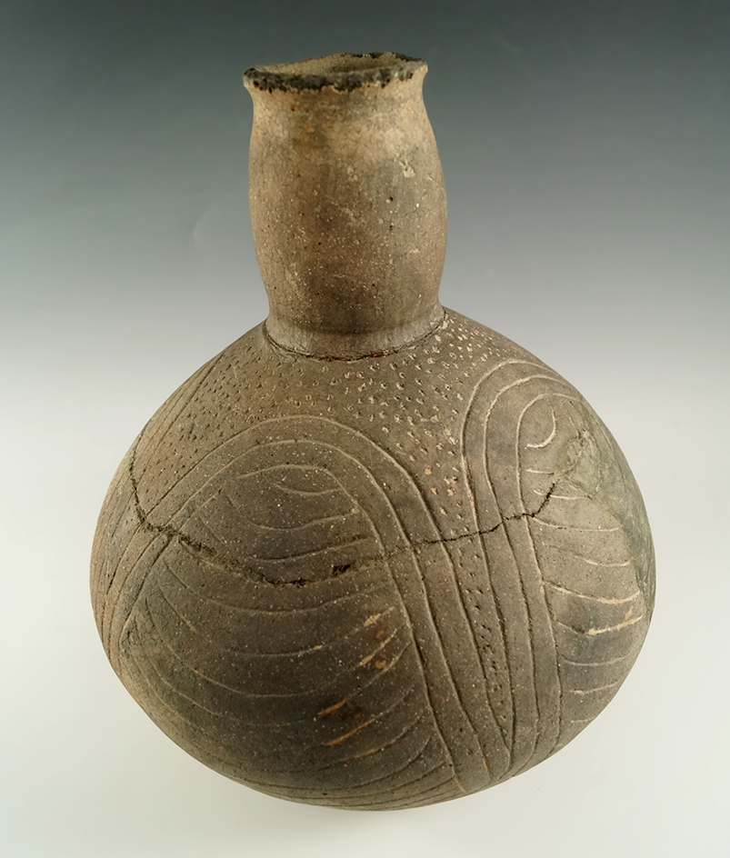 7 1/2" by 10 1/4" Bailey Incised Bottle (E. Texas) with some restoration, some reglued pieces.