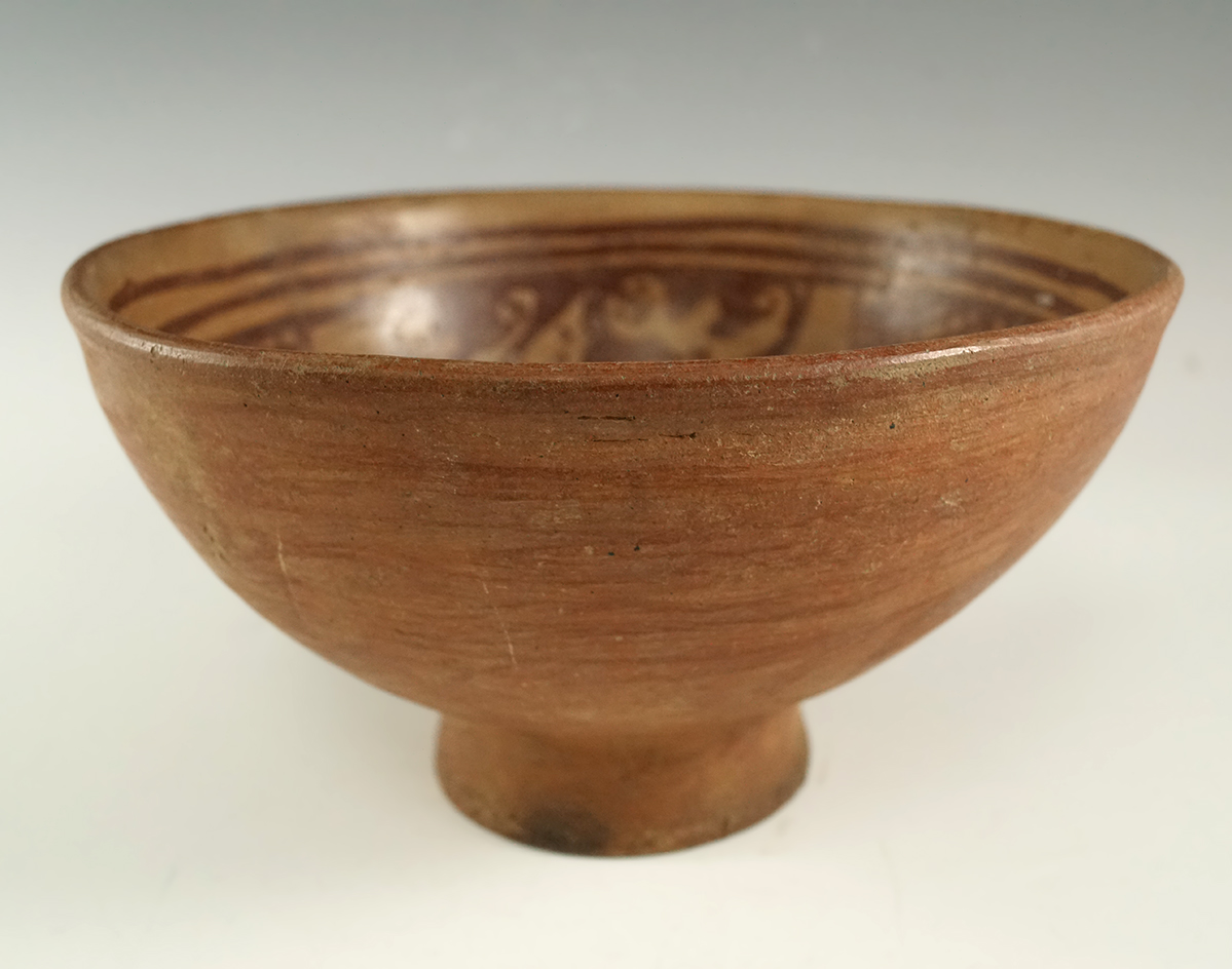6 3/4" wide by 3 3/4" tall Narino culture pedestal bowl with negative avian effigy figures.  COA.