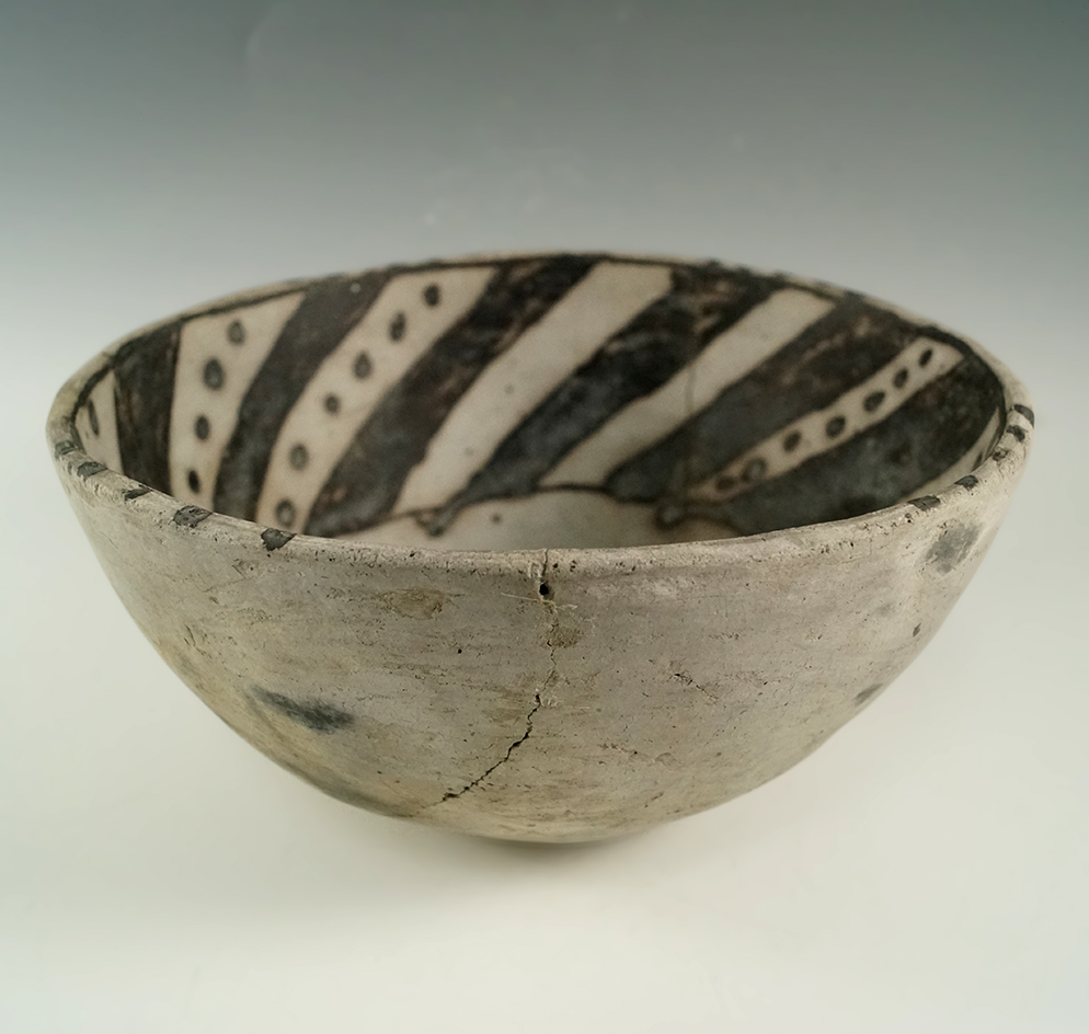 7 1/16" wide by 3 3/8" tall Anasazi Snowflake Bowl Found in southeast Utah.