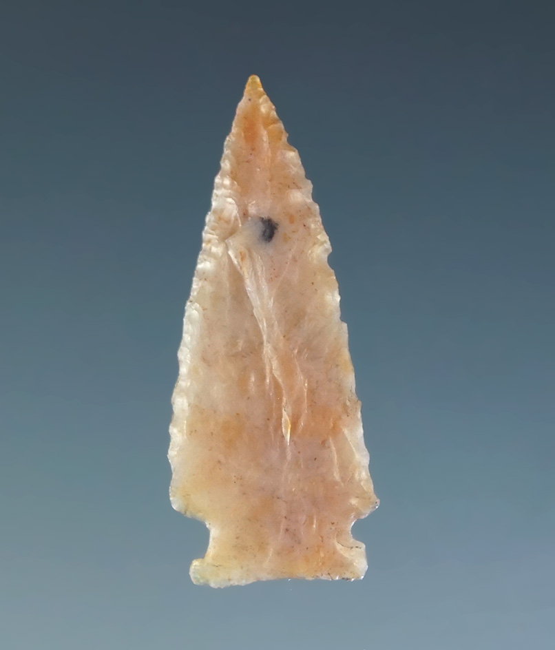 Exceptionally thin 15/16" arrowhead made from a flaked of pink chalcedony California.