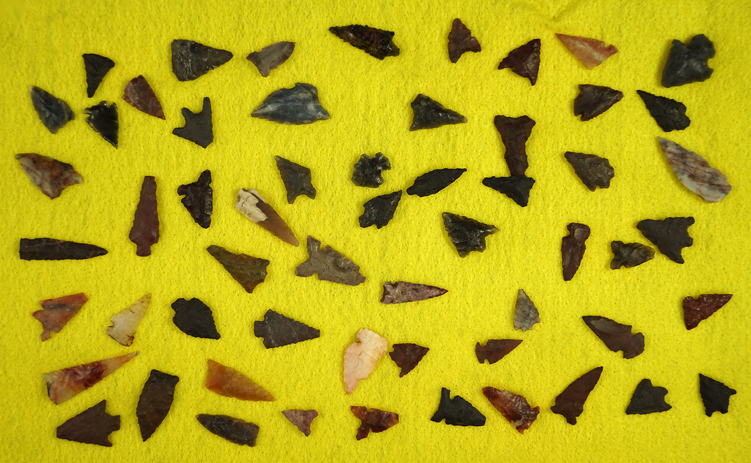 Large group of 58 assorted arrowheads found in northern California in various conditions.
