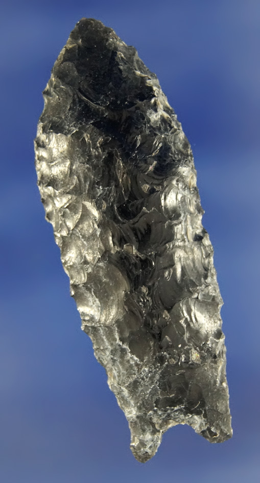 2 7/8" Obsidian Humboldt Constricted Base that is heavily oxidized found in California.