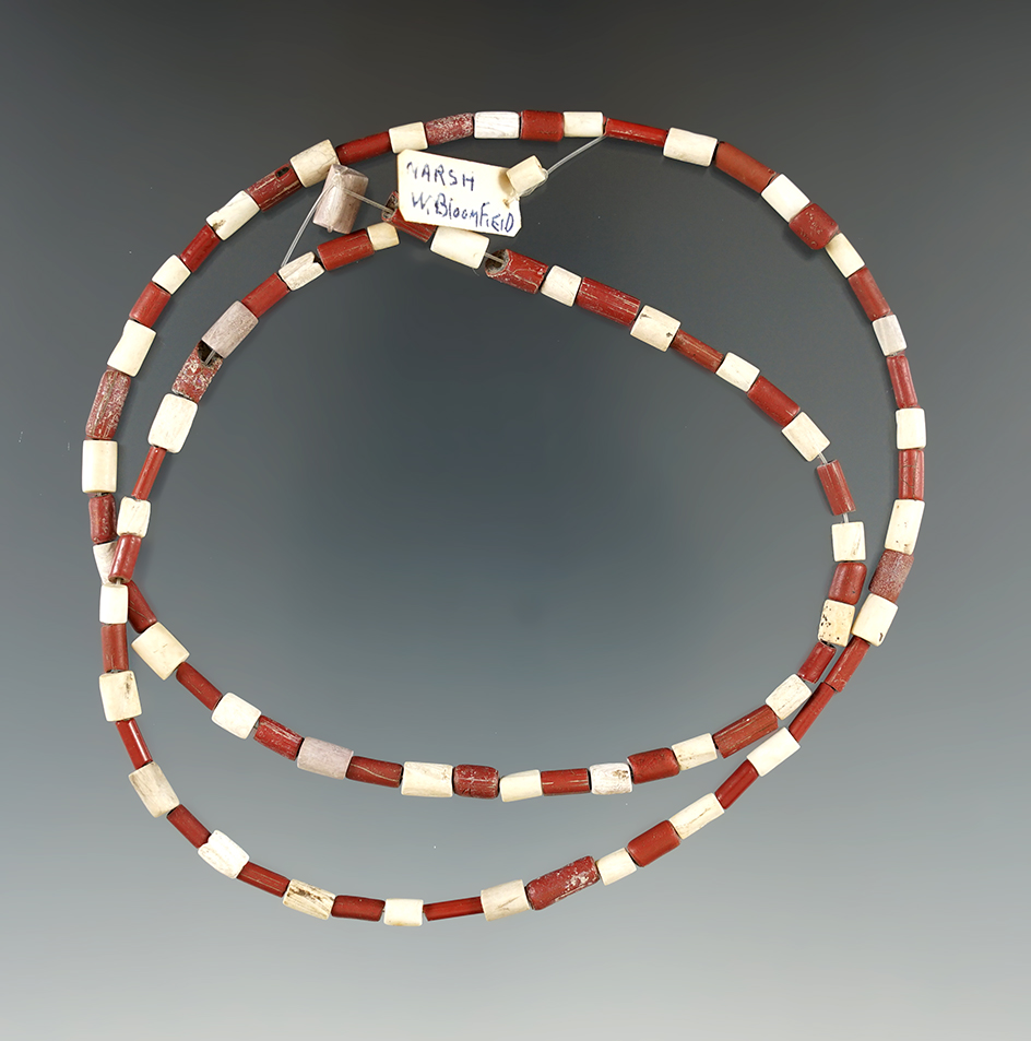 22" Long strand red Shell Tube Beads.