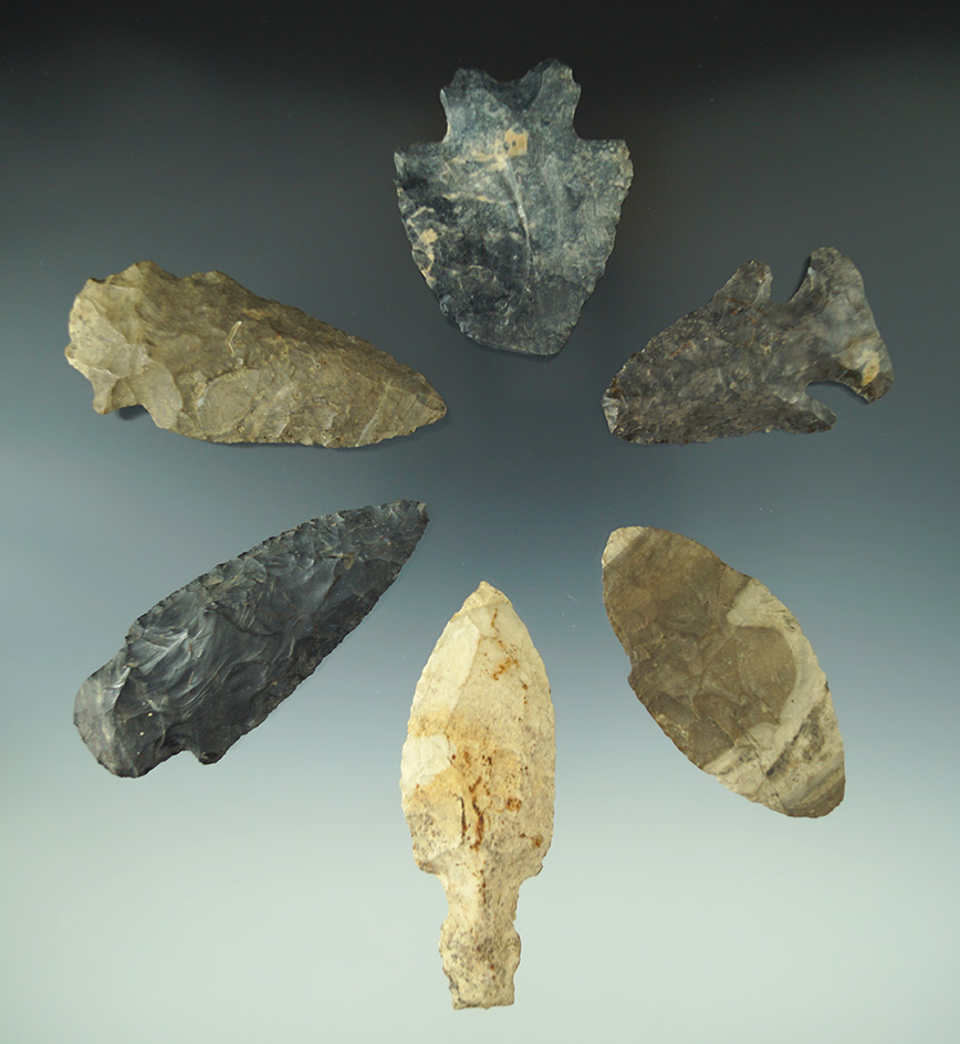 Set of six arrowheads in various conditions found in Michigan, largest is 3 1/16" long.