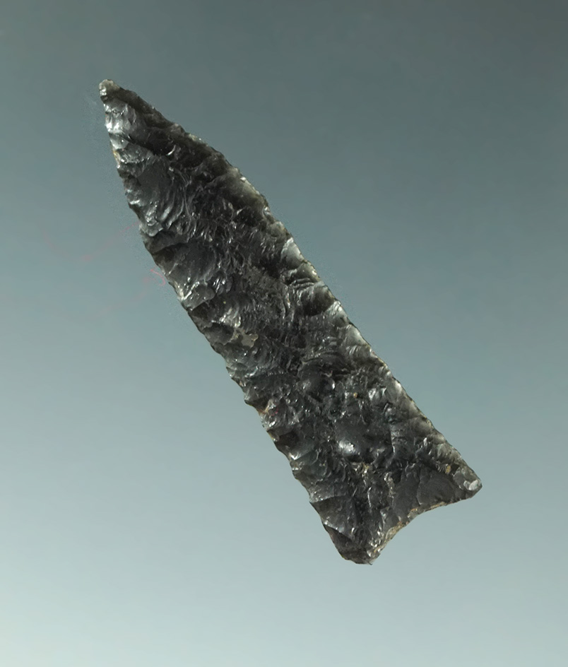 Beautifully flaked 1 9/16" Triangular arrowhead found in Alaska.