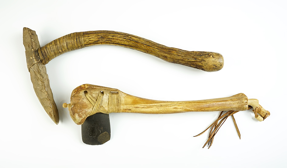 Pair of authentic Stone Tools with contemporary hafts that made a nice display. 
