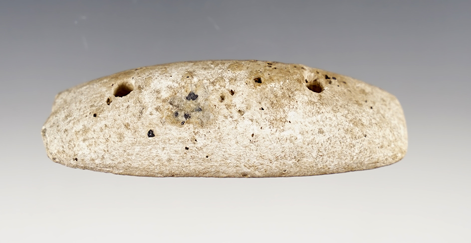 Finely made 3 1/4" Humped Gorget made from patinated Galena. Found in Ohio.