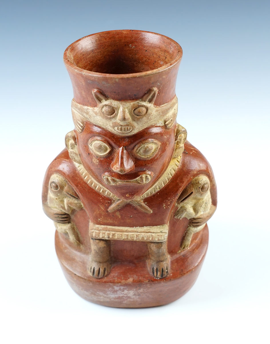 7 3/8" tall x 4 7/8" wide Moche Figural Bottle featuring the God Ai-Apec. Recovered in Peru. 