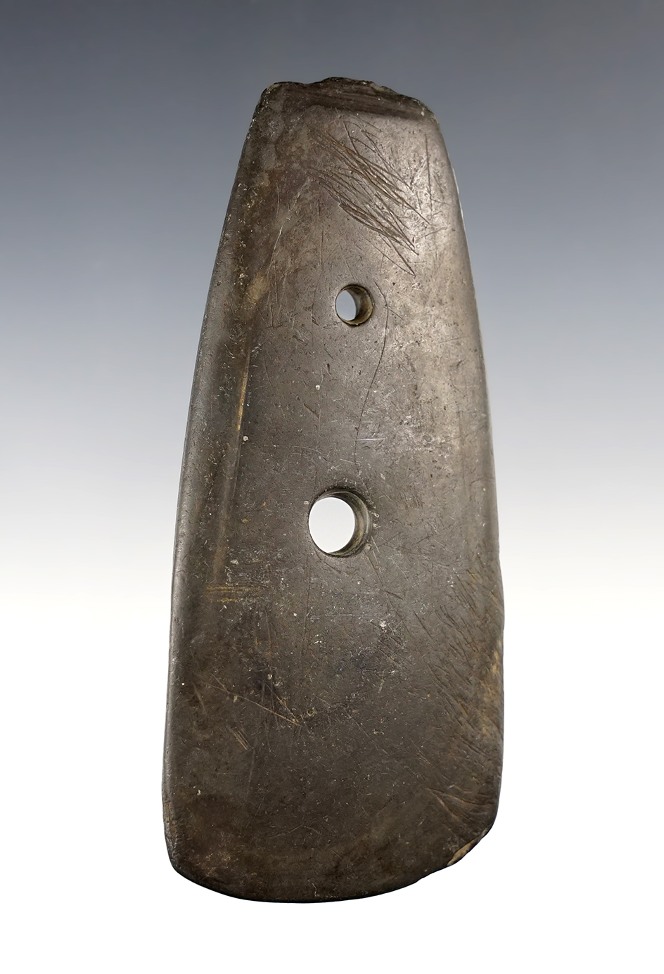 Uniquely styled 4 11/16" 2-Hole Gorget that is heavily patinated. Found in the Midwestern U.S.