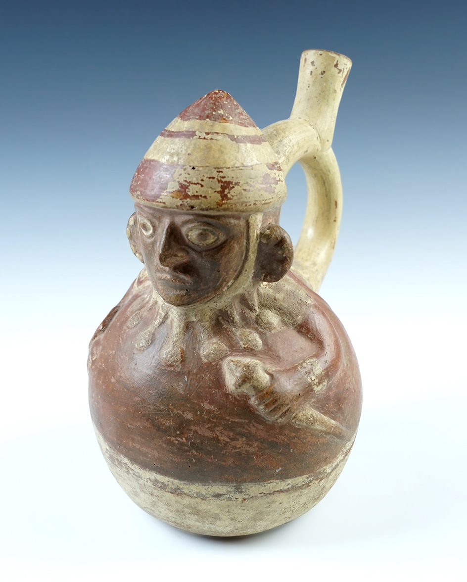 8" tall Moche II Human Effigy Bottle. One small crack at top of spout. Nice original paint. 