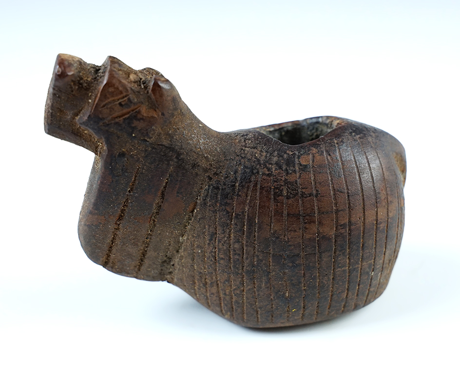 3 1/4" Llama Canopa that is nicely carved from wood. 