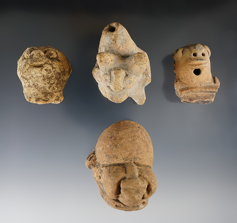 Set of four pre-Columbian pottery heads found in Mexico, largest is 2 1/2".
