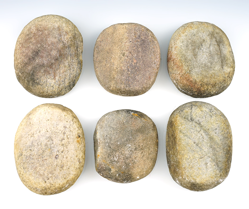 Set of six classic style, well used mano grinding stones found in New Mexico. Largest is 4 1/4".