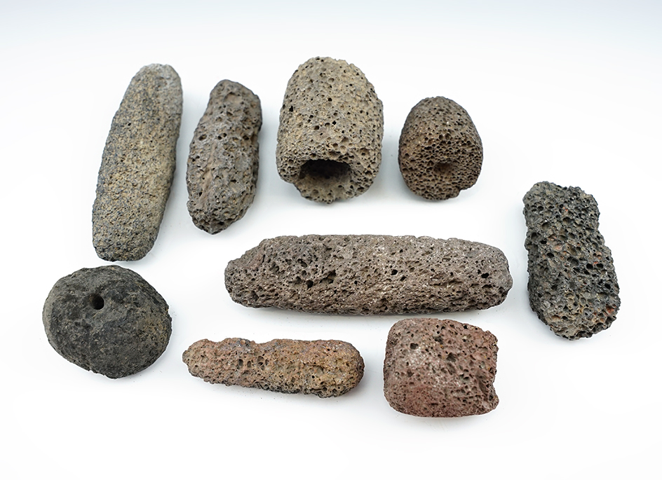 Set of nine lava stone artifacts found in New Mexico, largest is 4".