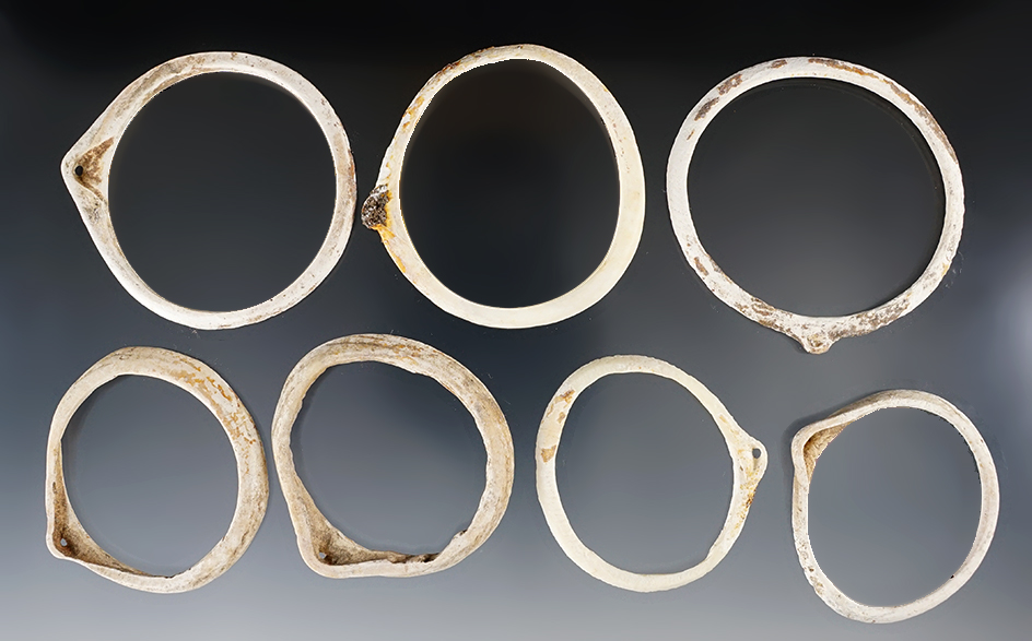 Set of seven beautifully styled shell ornaments with great age found in New Mexico. Largest is 2 5/8