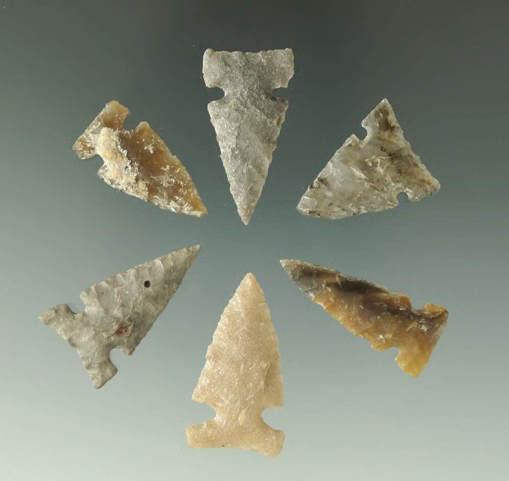 Set of six Sidenotch arrowheads found in the Dakotas, largest is 1 1/4".