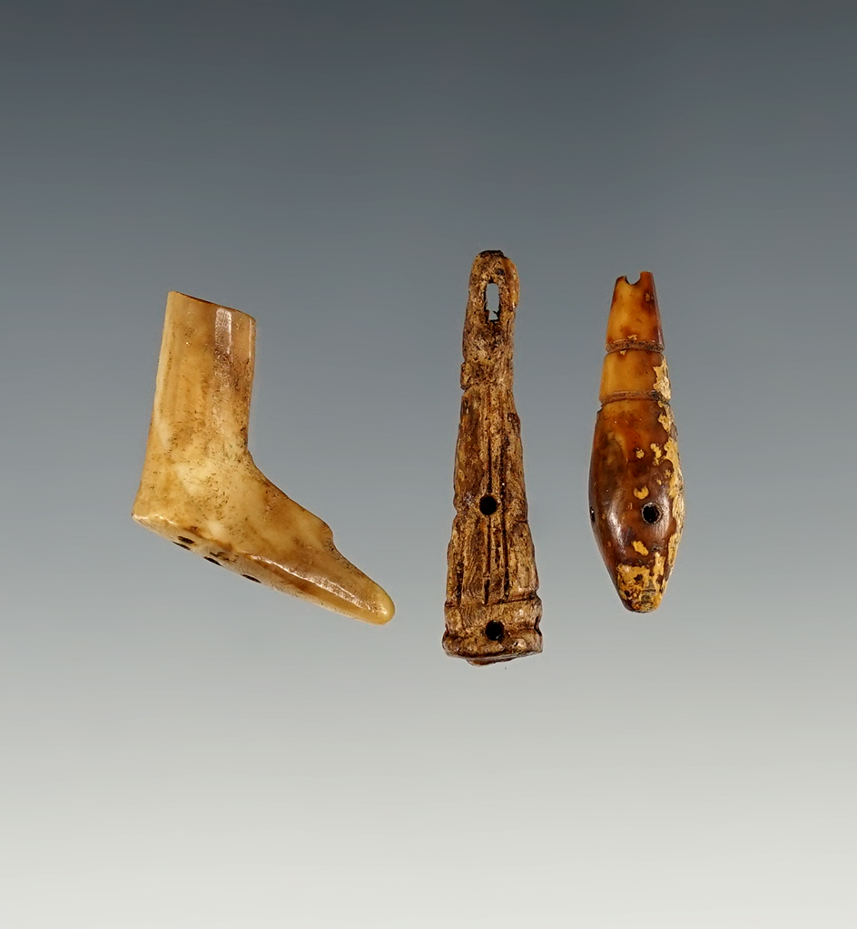 Set of three small decorative ivory artifacts, largest is 1 1/4".