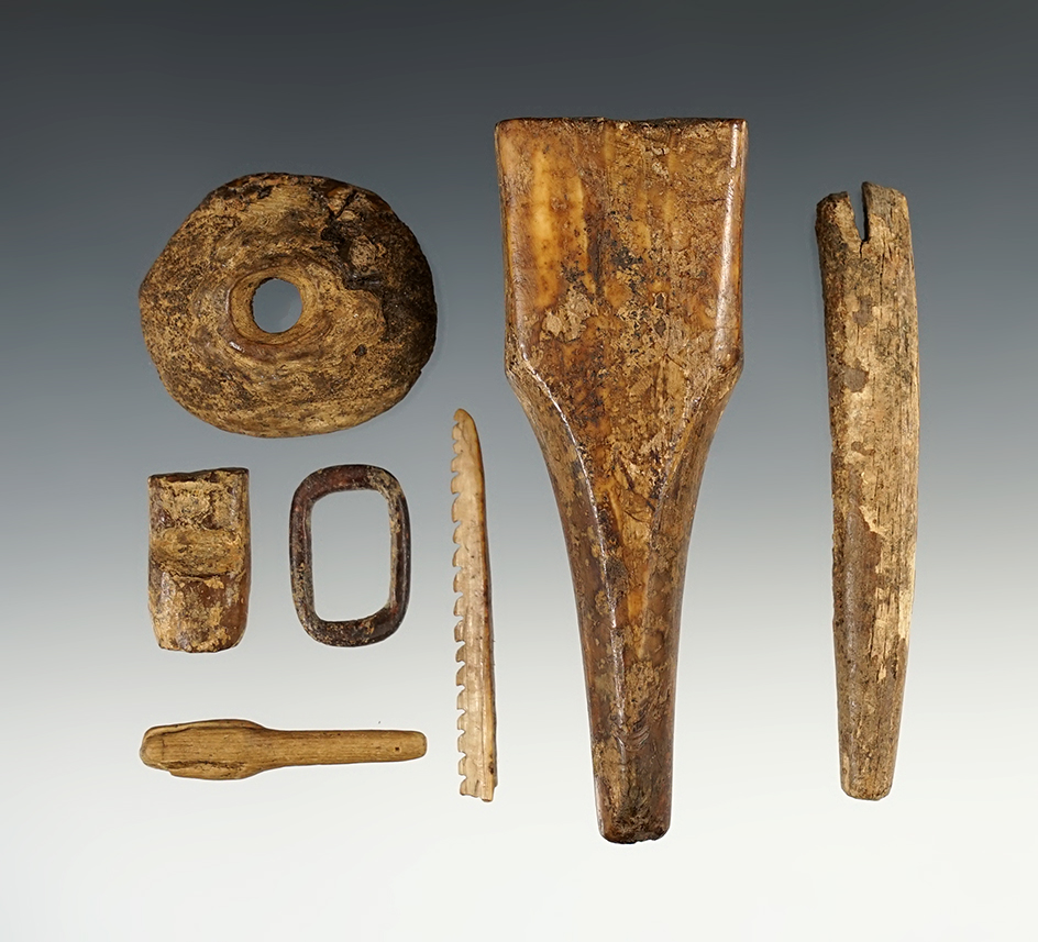 Set of seven assorted ivory and bone Inuit artifacts found in Alaska. Largest is 4".