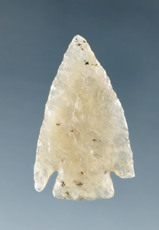 1" thin and very well flaked Cornernotch point made from attractive dendritic agate.