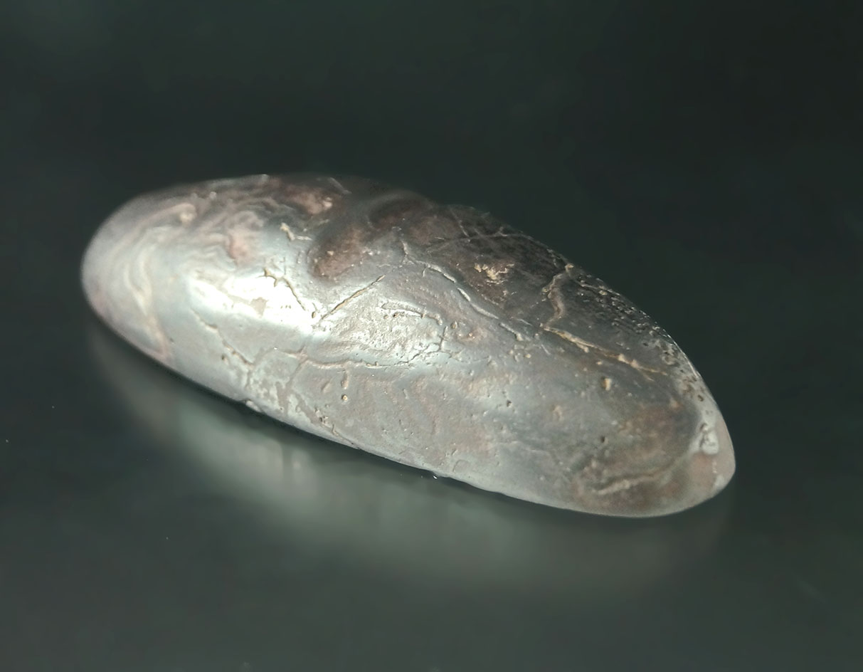 3 3/8" very rare style scooped and grooved Hematite Boatstone found in Adams Co., Ohio. Ex. Bell.