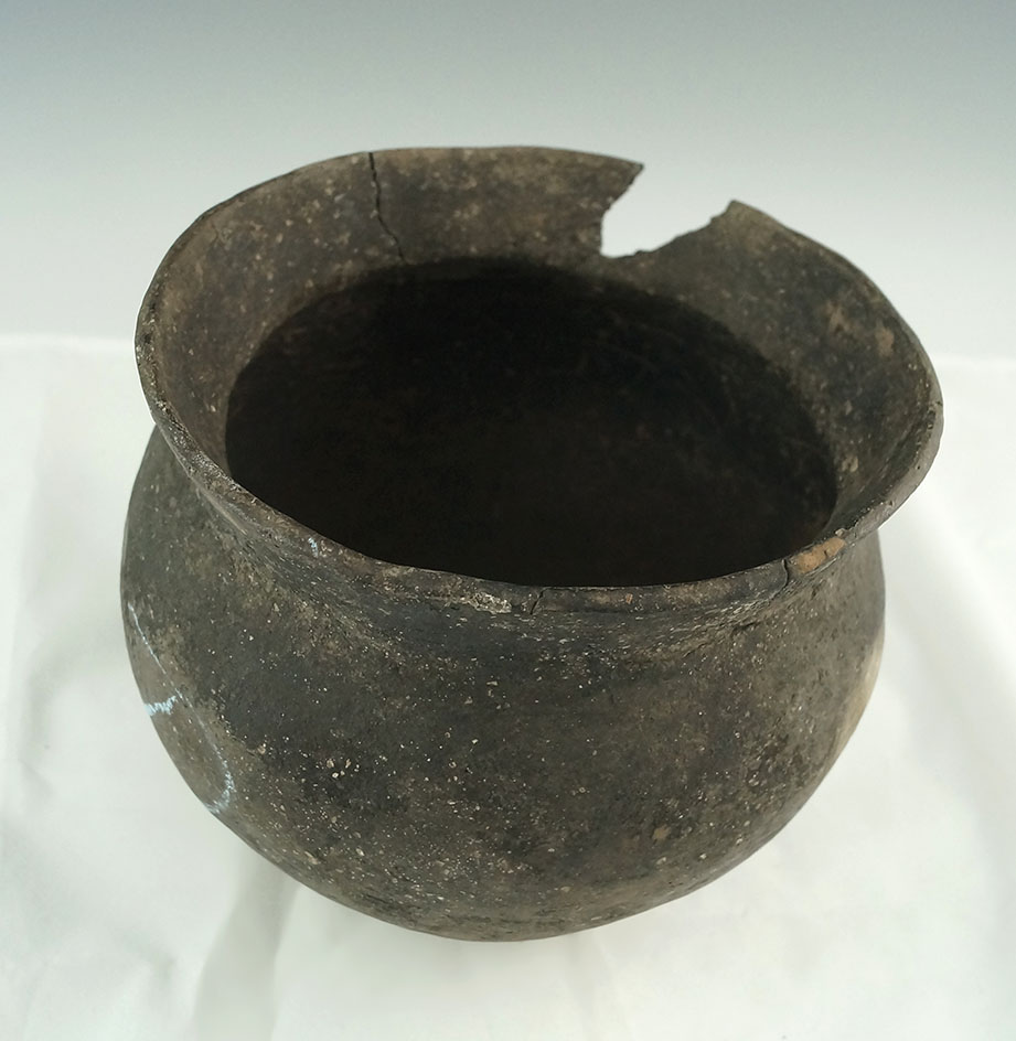 6 1/4" wide flared rim clay jar with three reattached pieces at rim, no filler used.