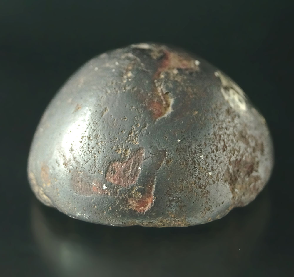 1 11/16" hematite cone that is beautifully patinated found in Bainbridge, Ross Co., Ohio.
