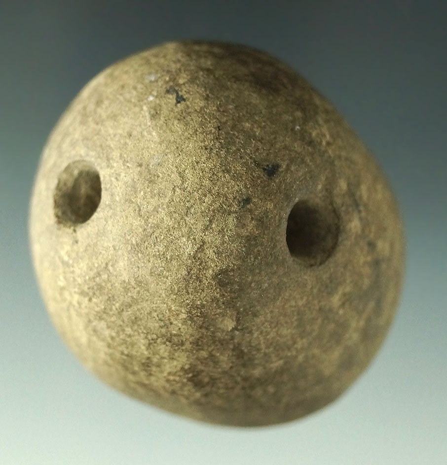 Uniquely drilled 2 1/4" stone weight found in Burbank, Wayne Co., Ohio.