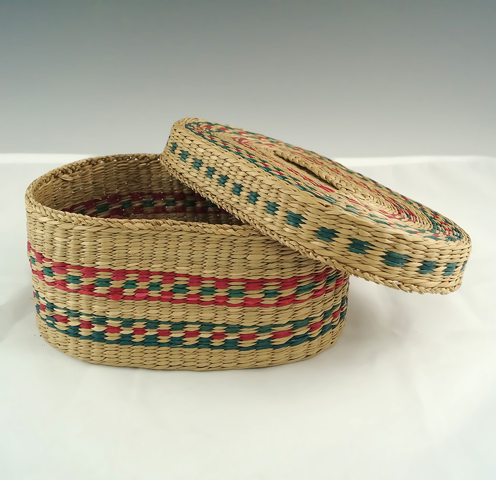 Nicely crafted 6 5/8" contemporary lidded basket that is very tightly woven and well made.