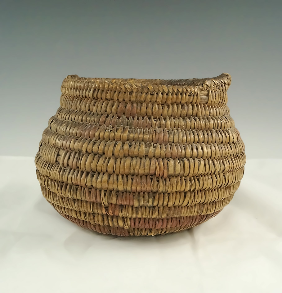 6" wide tightly woven New Mexico basket. Nice display item.