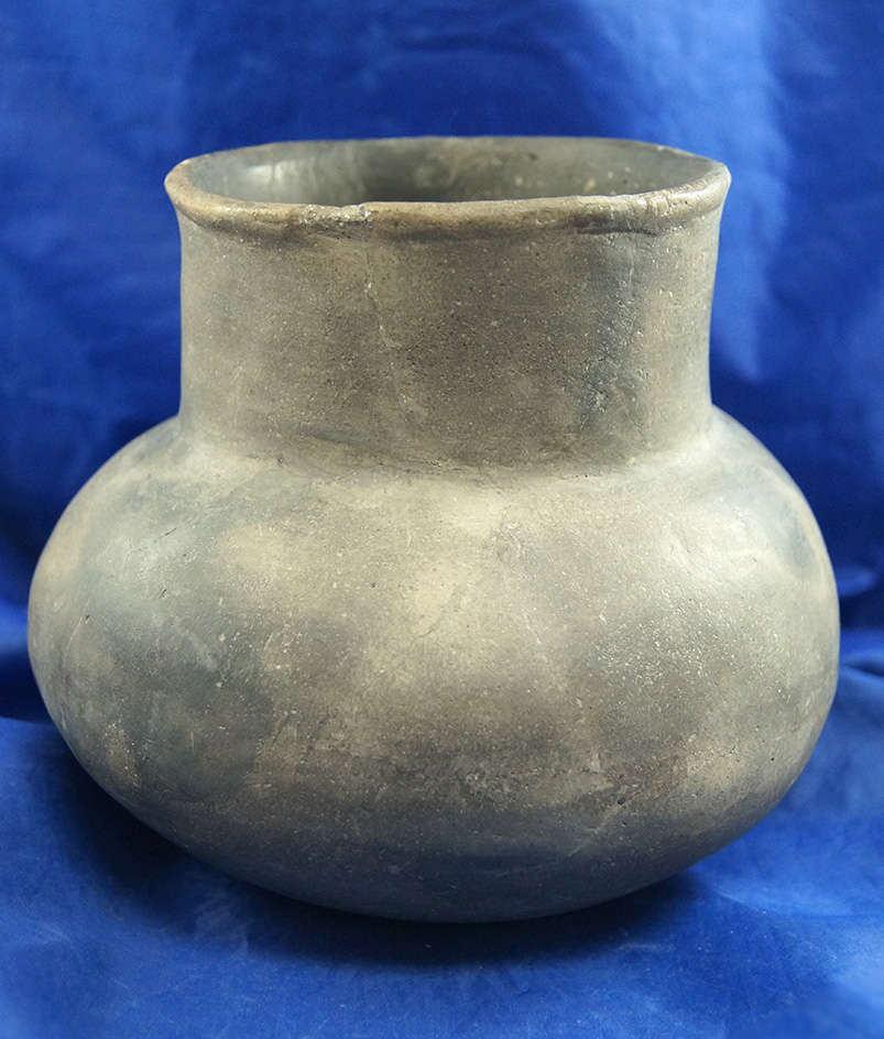 6" wide Mississippian Bottle that is restored.  Crosskno Site in Mississippi Co., Arkansas.