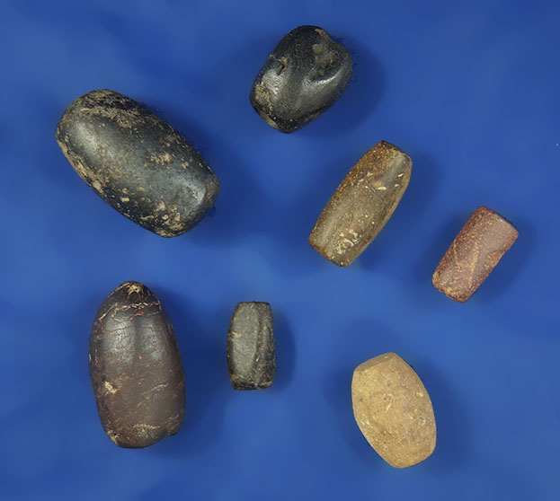 Unique selection of hematite and stone beads, several are partially drilled.  Found in Kentucky.