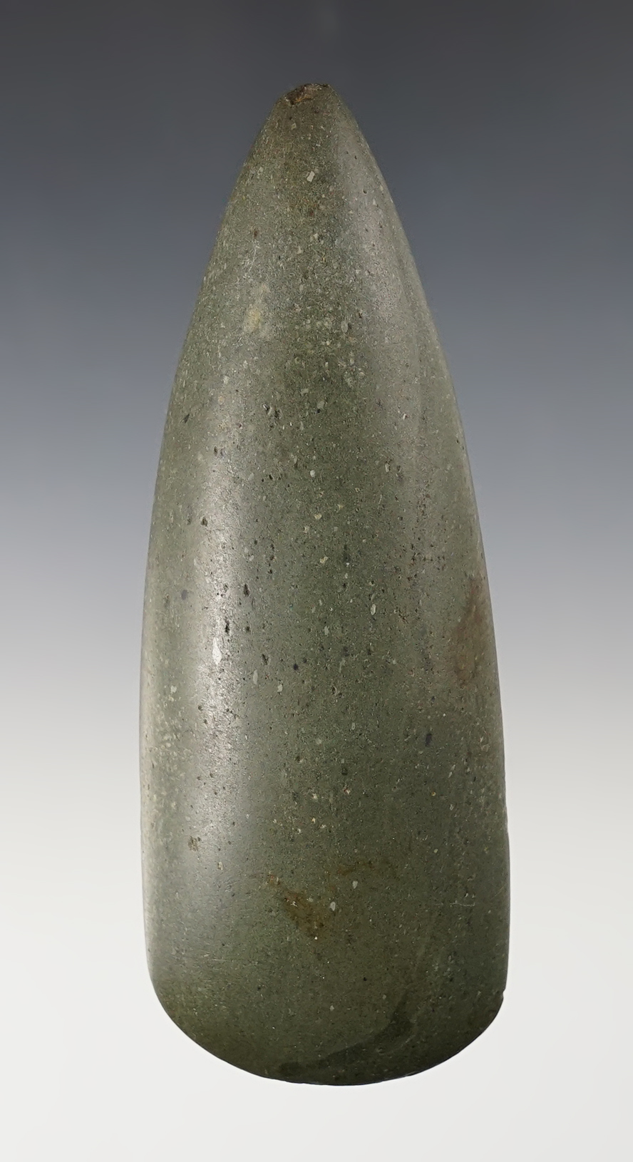 5" Taper Poll Celt that is heavily polished with nice form. Exact find location is unknown.