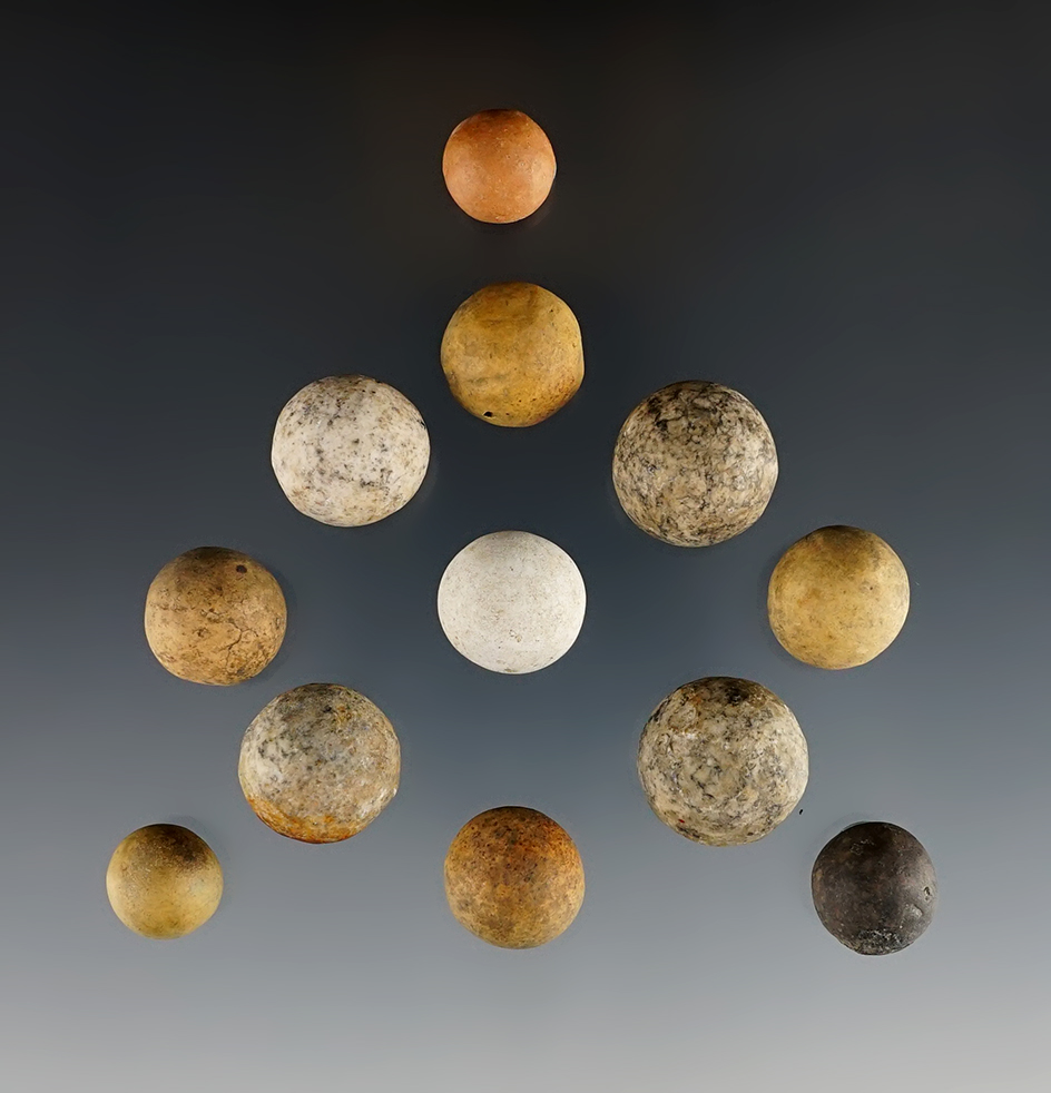 Set of 12 Historic Marbles in good condition. The largest is 3/4" in diameter.