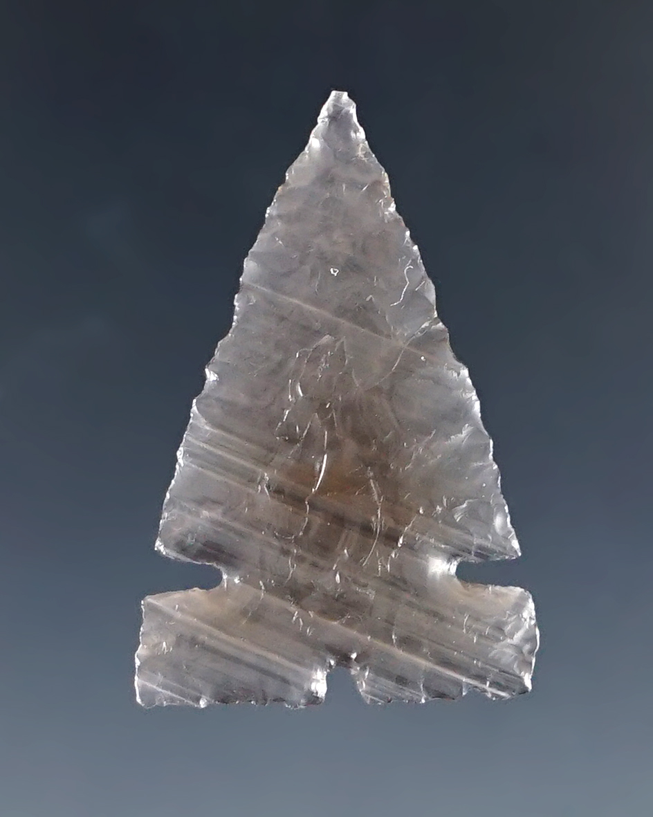 Very thin and well flaked 1 1/8" Obsidian Sidenotch - Oregon. Ex. Gene Favell Museum.