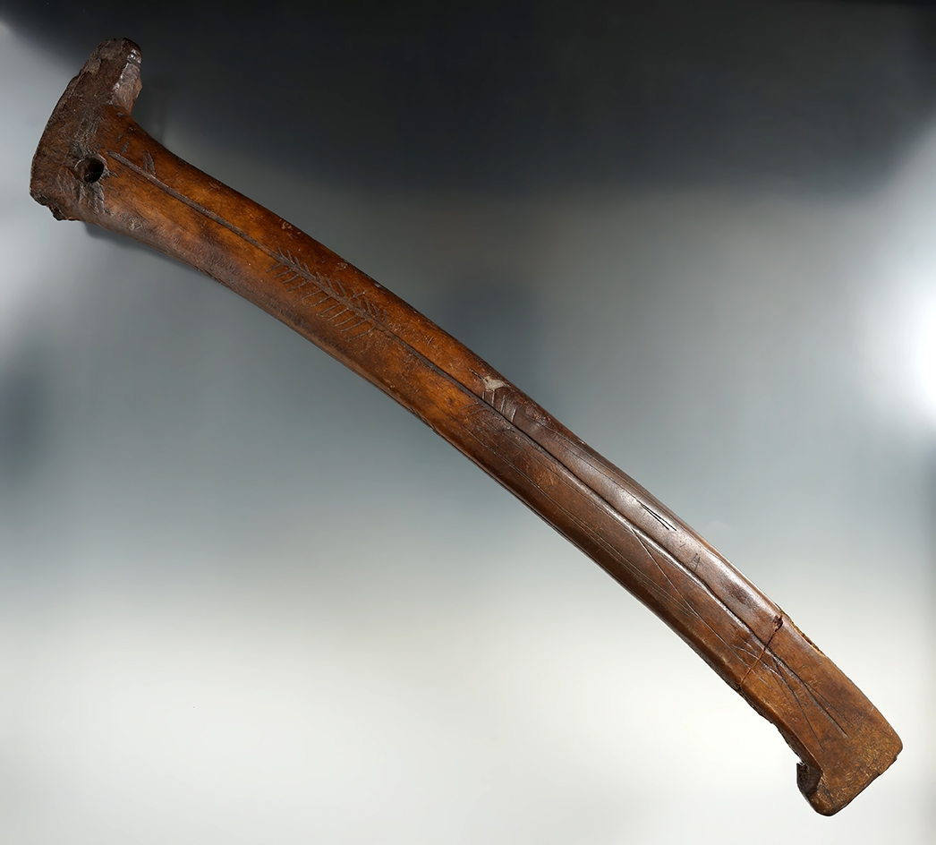 Nicely styled and decorated bone Adze handle from the Pacific Northwest.