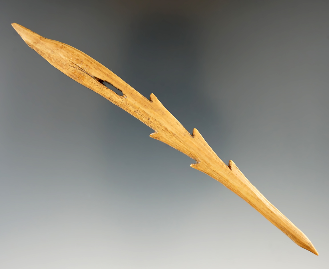 Nicely barbed 5 7/8" socketed bone harpoon tip found in Alaska.