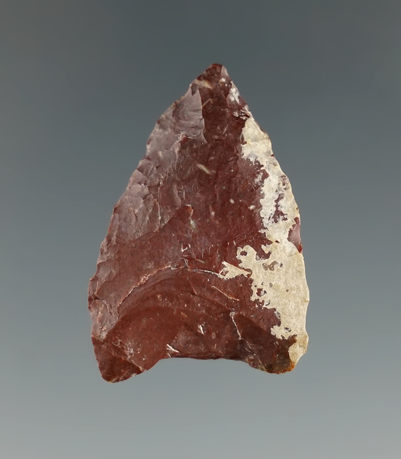 1 5/16" Paleo Dart point - red Jasper - found in Brookings Co., South Dakota by Harlan Olson.
