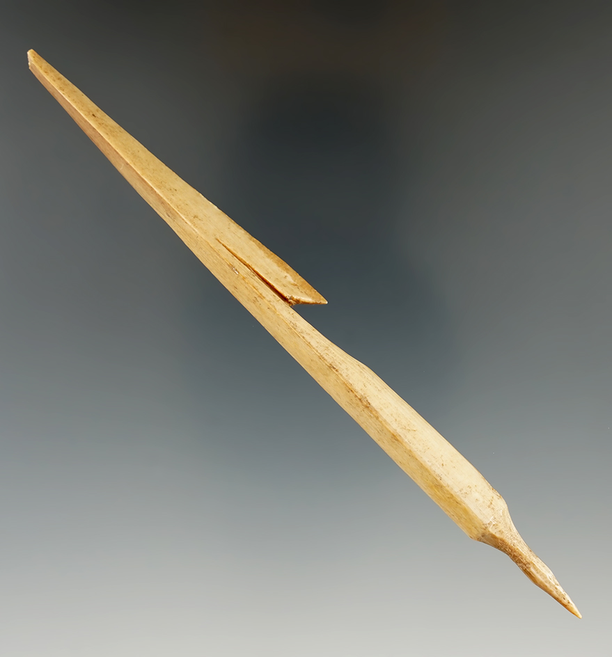 5 5/8" Inuit bone harpoon tip with the socketed end found in Alaska.