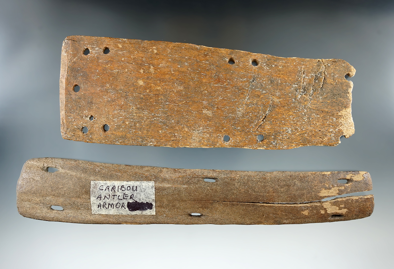 Pair of Inuit caribou bone armor sections found in Alaska, largest is 8 1/8".