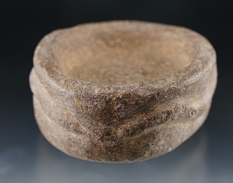 3 3/4" Diameter Stone Bowl/Pallet found in Arizona. Features 2 carved snake effigies on exterior.