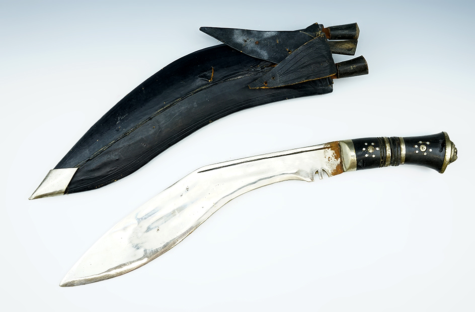 Vintage 16" Gurkah knife and sheath includes three smaller knives from India.