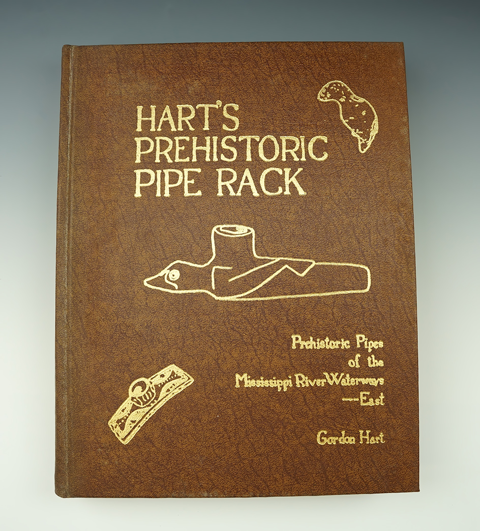 Hardcover book: "Hart's Prehistoric Pipe Rack" by Gordon Hart. In very decent condition.