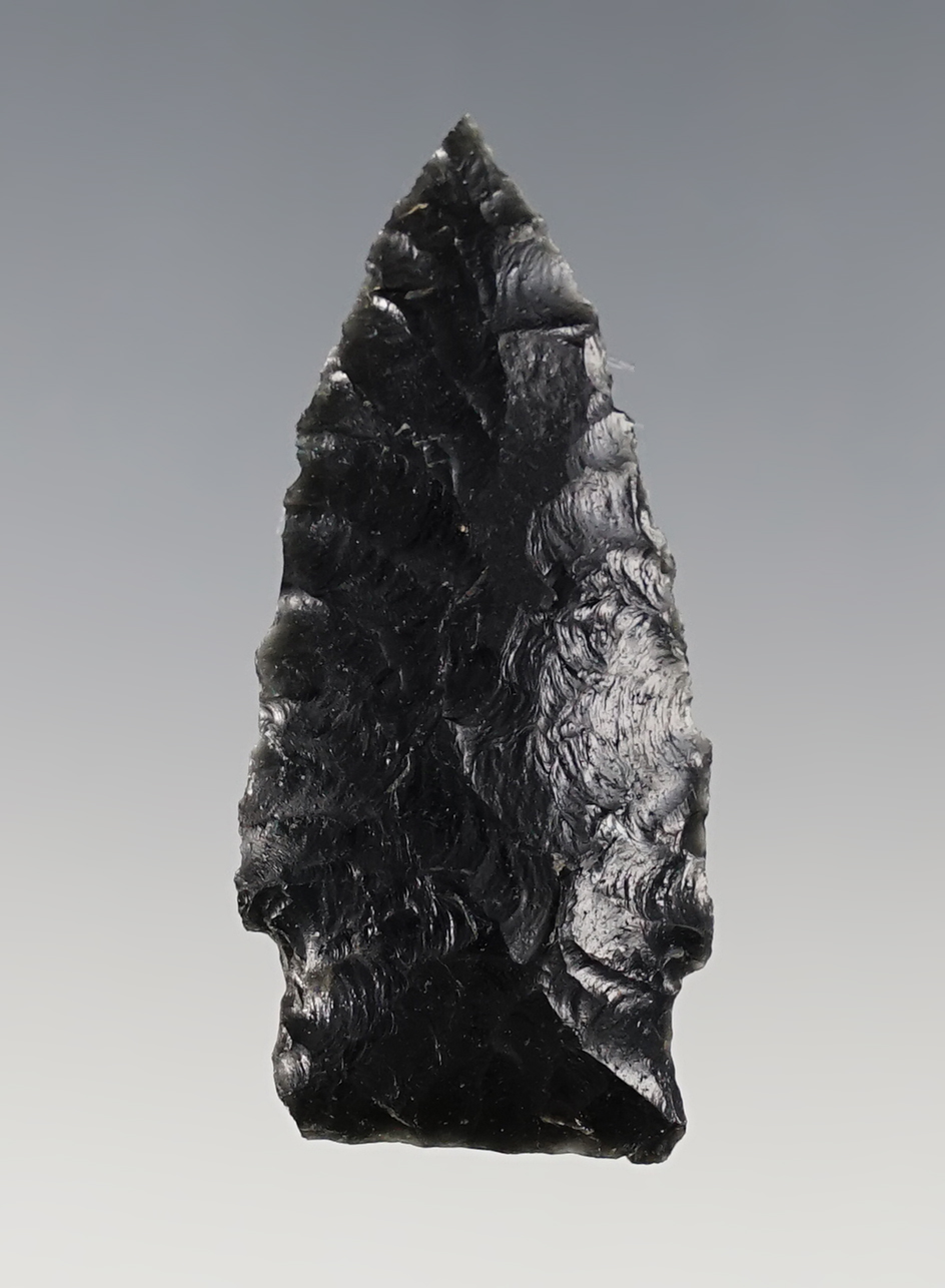 2" Paleo Scottsbluff with a nicely ground stem. Found near Crump Lake, Lake Co., Oregon. 