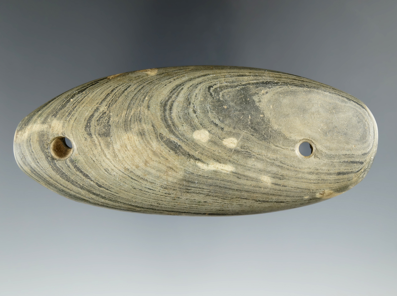 4 7/16" Glacial Kame Gorget found in Ionia Co., Michigan. Ex. Spaulding, Kiel, Chadwick (#437).