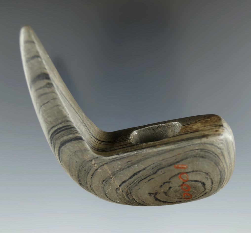 2 1/2" Archaic Geniculate made from green and black Banded Slate, found in Seneca Co., Ohio.