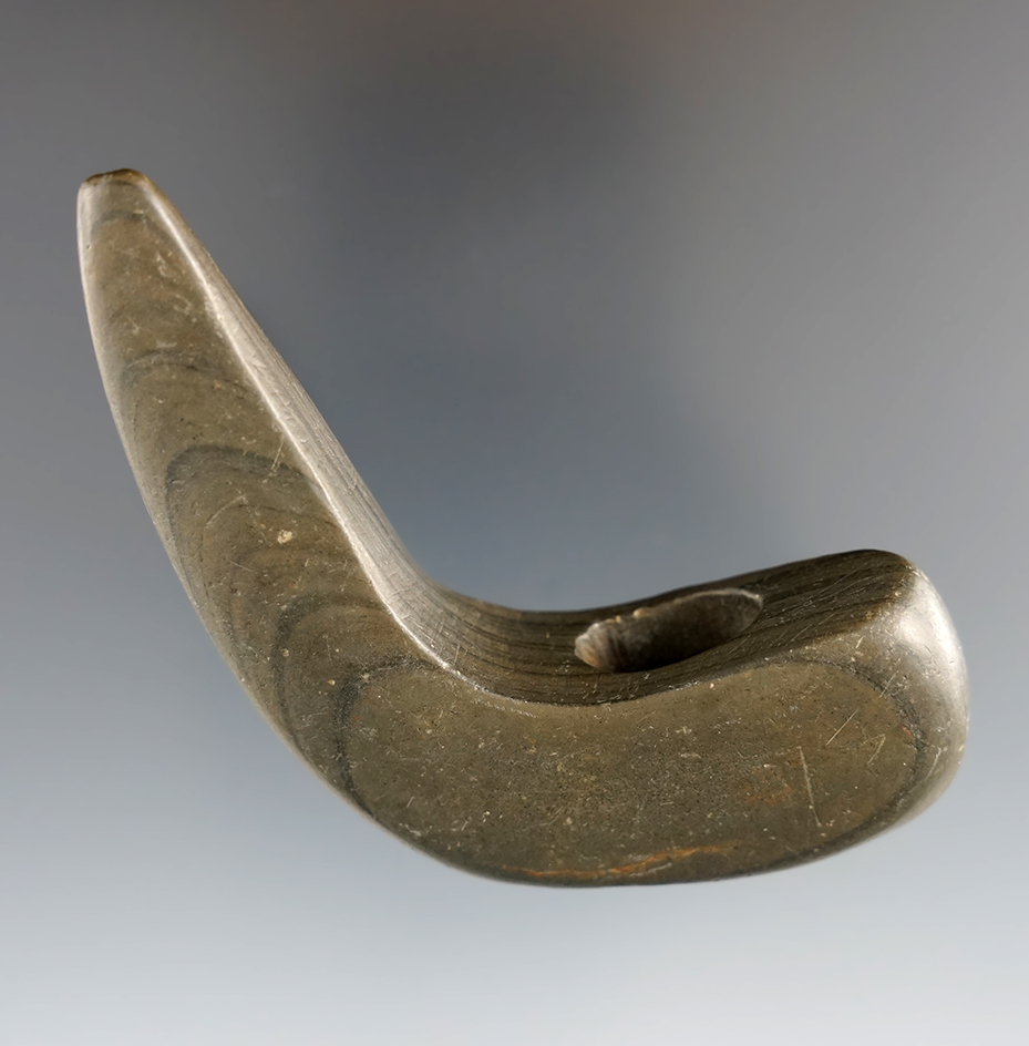 3" Archaic Geniculate made from green and black Banded Slate, found in Sandusky Co., Ohio.